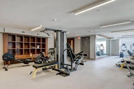 Near Stampede!! Guest Favorite Riverside Retreat- Walking Trails, Downtown, Free Banff Pass, Wine, Gym, Parking! * Calgary